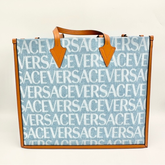 Versace Handbags - NEW Versace Denim Tote with logo print bag